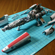 Illustration for article titled Japanese craftsman creates perfect sci-fi ship replicas using just paper